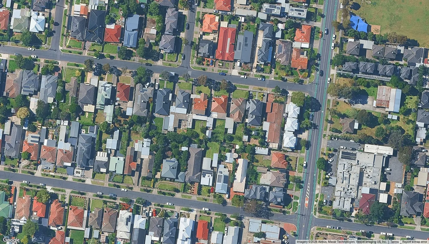 Aerial view of 183 Derby St, Pascoe Vale VIC and the blocks around it, the parcel outlined in amber